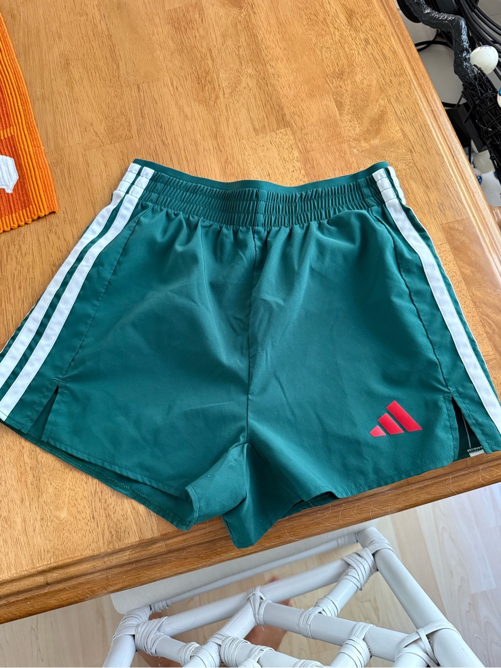 adidas Teal Women’s Athletic Shorts with White Stripes and Red Logo